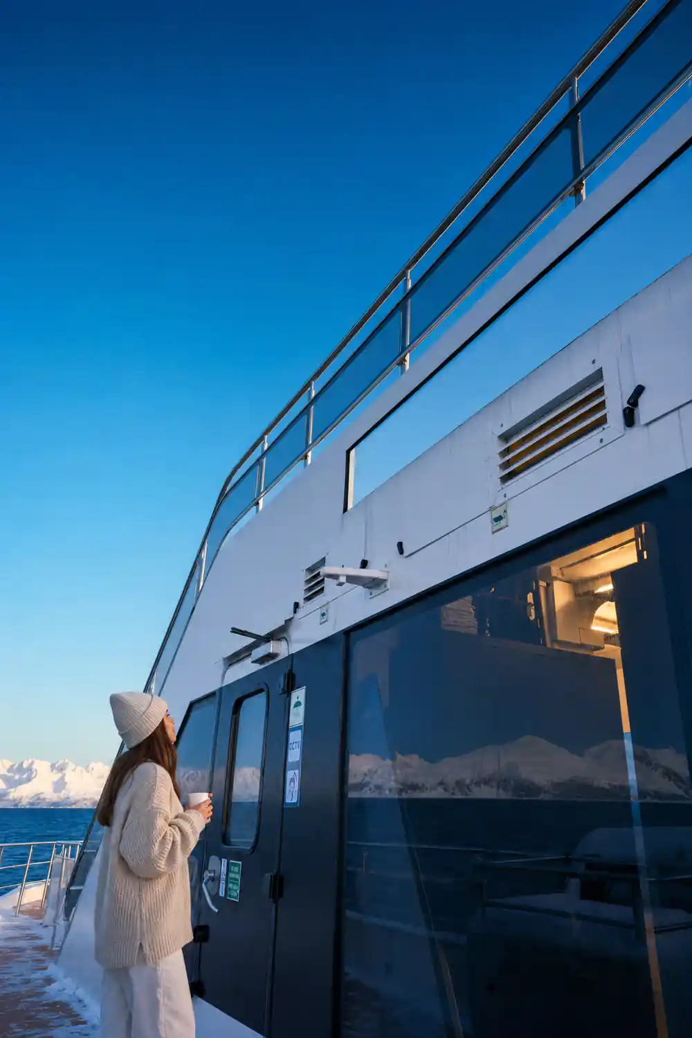 Modern ferry boat hull exterior in blue light